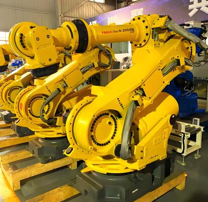 Sistema di taglio laser robot FANUC chiavi in mano con raffreddamento ad acqua, custodia di sicurezza, per la lavorazione 3D dei tubi di lamiera metallica